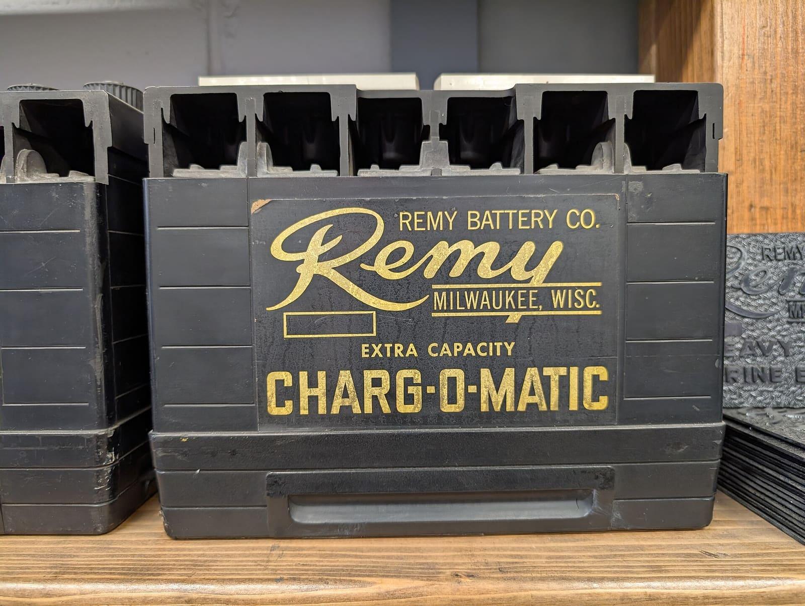 Jump leads connected to a Nissan Patrol battery terminal